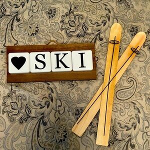 Ski lodge decor wooden skis and sign